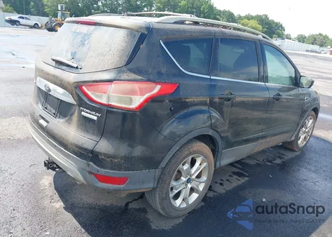 2014 Ford Escape Titanium z USA, uszkodzony, nr VIN 1FMCU0J99EUA27367